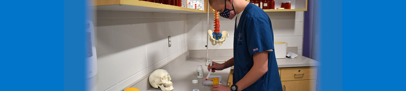 Health Science Academy student practicing pharmacy tech skills