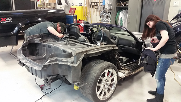 Student work on the Dodge Viper brought in with a crushed back end.