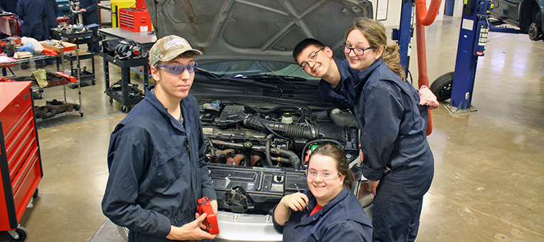 Auto Service Technology students inspect a customer's vehicle.