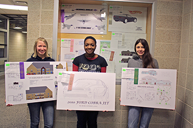 Females CAD students pose for a photo with their award-winning renderings.