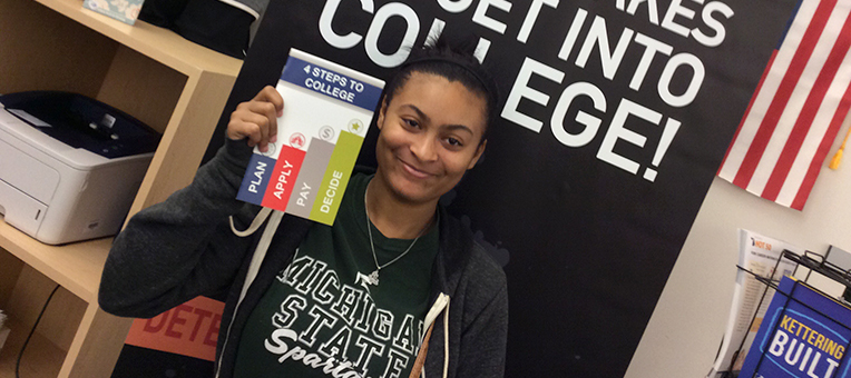 A teenage lady shares the four steps to college: plan, apply, pay, decide.