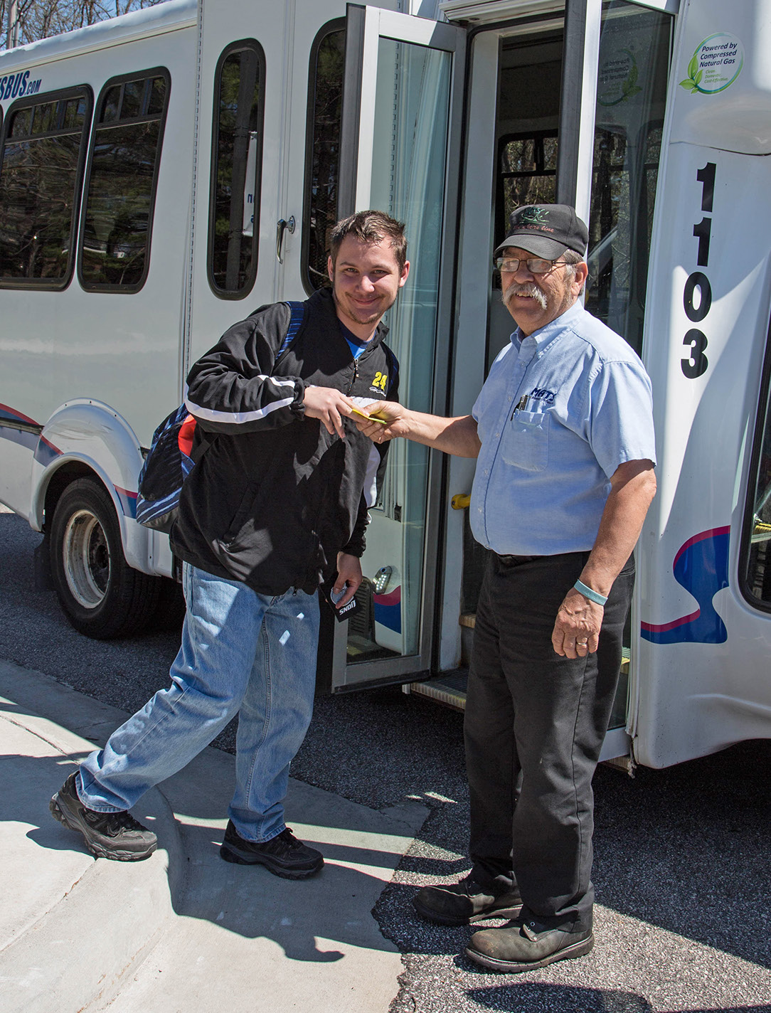 Man and Public Transit Bus Driver