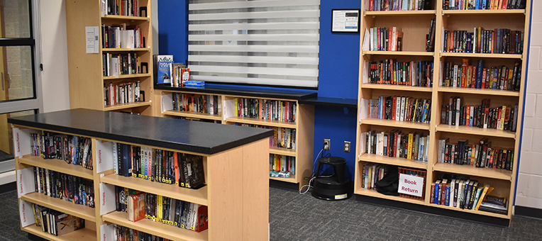 full bookshelves inside ARC library