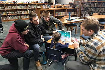 Bio Tech & Engineering students working with a client.