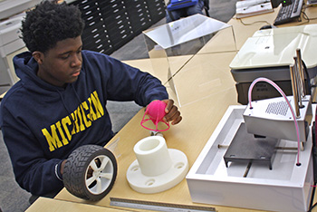 CAD student examines 3D printing project