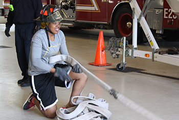 Photo of Criminal Justice student at Muskegon Fire Department.