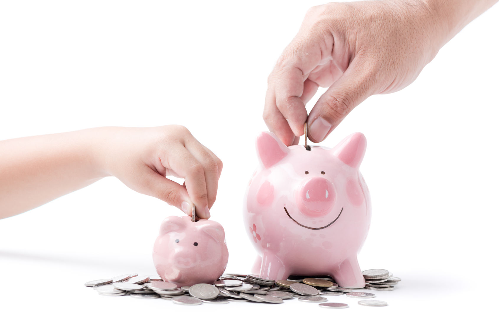 Large and small piggy bank with coins